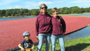03-ollie-jeanne-and-heather-with-cranberry-backdrop